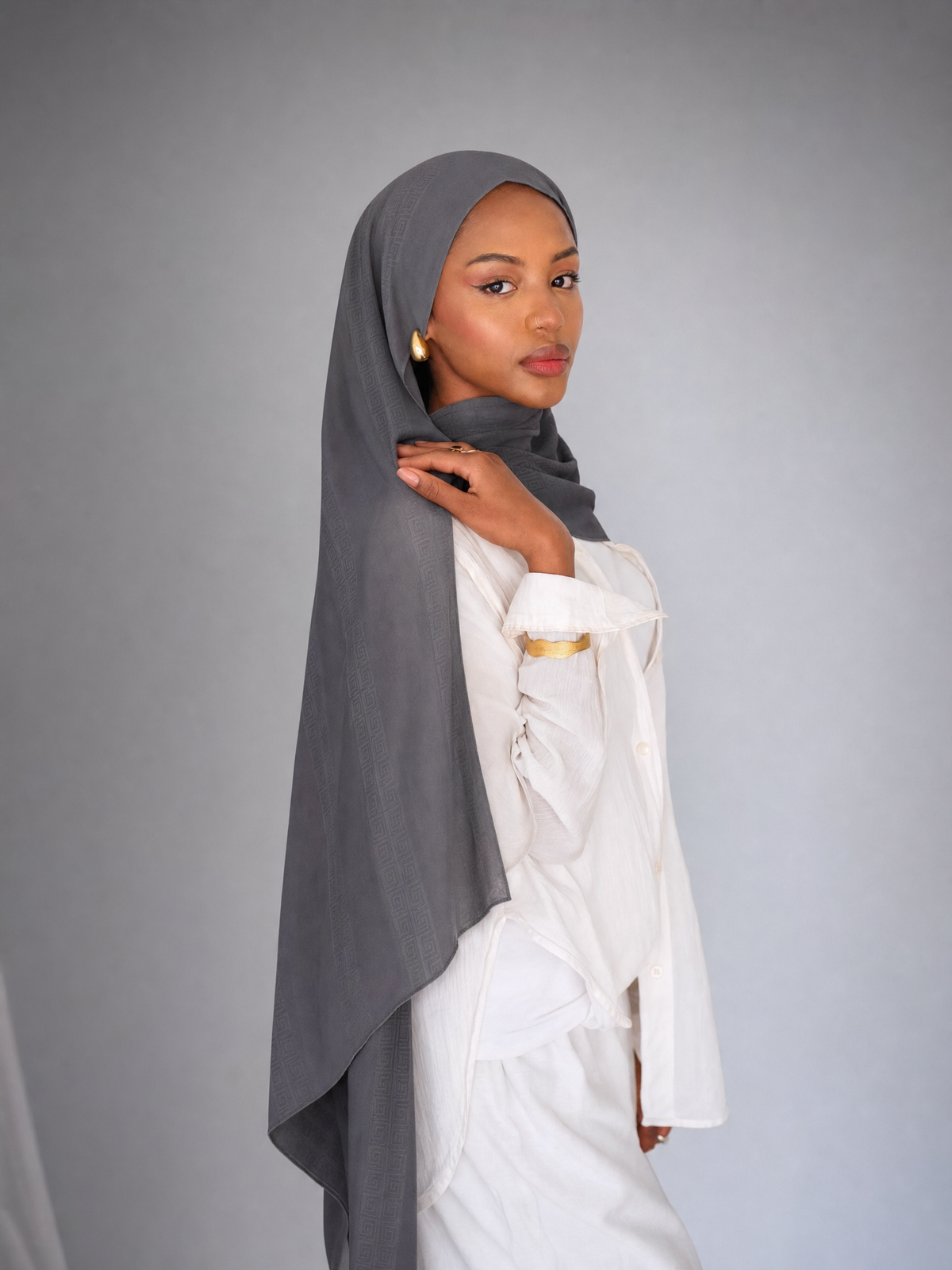 Athena Key Kuwaiti scarf in Dark Grey with Greek key jacquard stripe design #Color_Dark Grey